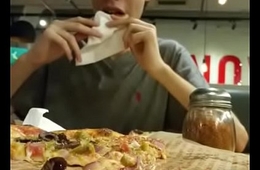 Big hot pizza being eaten nonstop
